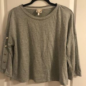 Gray sweater with button up sleeve